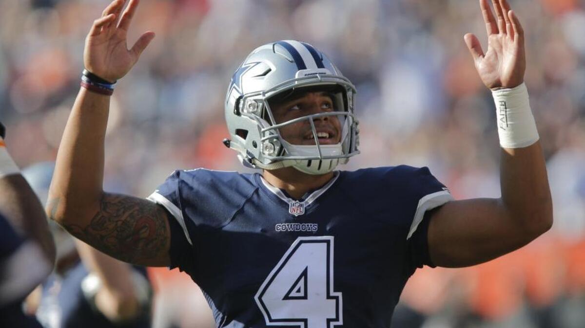 Dallas Cowboys quarterback Dak Prescott signals touchdown after running back Ezekiel Elliott scores against the Cleveland Browns on Nov. 6. The Mississippi State product was a fourth-round selection in last year’s NFL Draft.