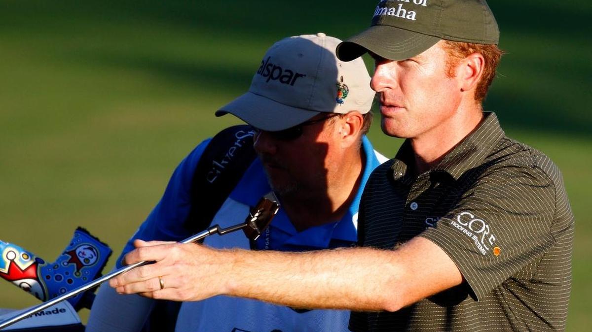 Roberto Castro directs, right, his caddie to his ball on the final hole in the first round of the Sanderson Farms Classic golf tournament in Jackson on Nov 5, 2015.