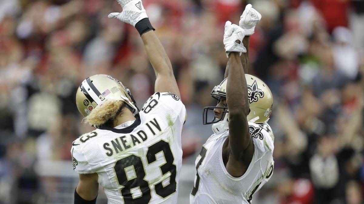 New Orleans Saints wide receiver Michael Thomas, right, is greeted by teammate Willie Snead after scoring a touchdown against the San Francisco 49ers on Sunday in Santa Clara, Calif.