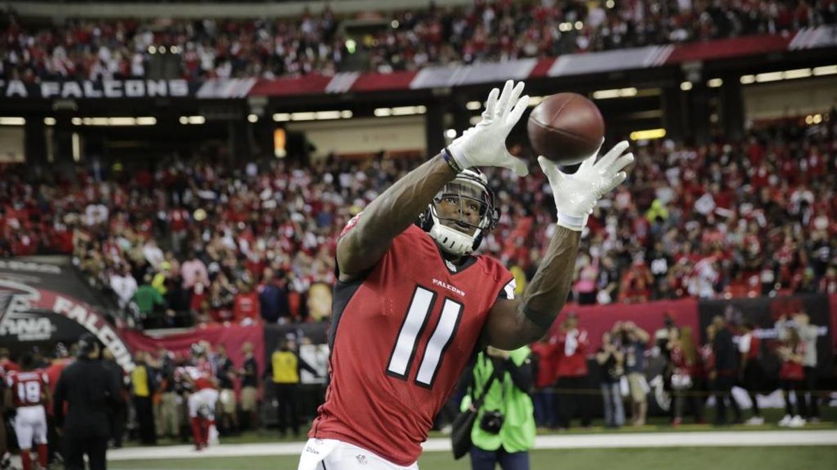 Atlanta Falcons wide receiver Julio Jones (11) warms up before the NFC divisional playoff game against the Seattle Seahawks, Jan. 14, 2017, in Atlanta.