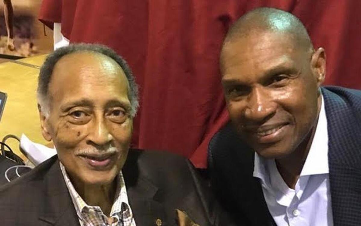 Leslie Frazier, right, with his beloved coach Marino Casem at the Mississippi Sports Hall of Fame Museum.