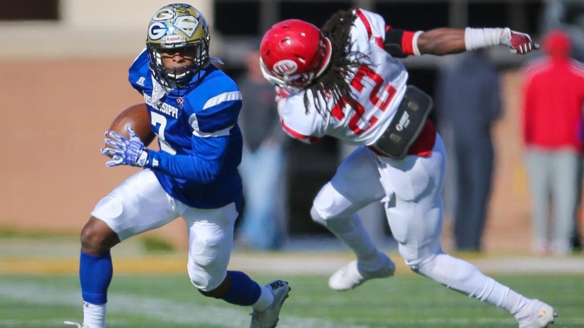 Mississippi's Tylan Knight (3) slips past Alabama's Kevontae Ruggs (22) on a punt return. Mississippi played Alabama in the annual Mississippi-Alabama All-Star Football Game at the University of Southern Mississippi on Saturday.