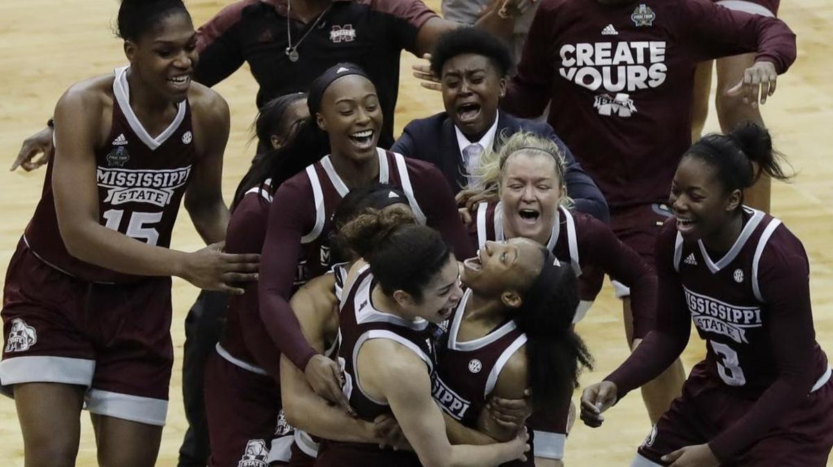 Mississippi State guard Morgan William, center, celebrates with teammates after she hit a buzzer basket to defeat Connecticut in the semifinals of the women’s Final Four on March 31 in Dallas. The Bulldogs graduate only four seniors and could be a force once again in the 2017-18 season.