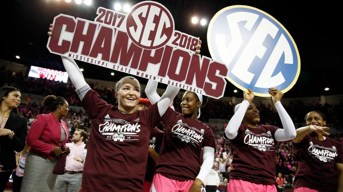Mississippi State players celebrate their capturing the SEC regular-season title following their 76-55 win over Texas A&M in their NCAA college basketball game in Starkville, Miss., Sunday Feb. 18, 2018.
