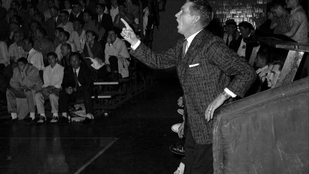 Mississippi State's coach Babe McCarthy sounds off from a bench during a game against Tulane University in New Orleans in this Feb. 24, 1959 file photo. Loyola's Jerry Harkness called the 1963 Mideast semifinal basketball game against McCarthy's team "the beginning of the end of segregation" and insisted that both teams won. The final score was Loyola 61, Mississippi State 51, but the final impact of that basketball matchup at Michigan State University may never be felt.