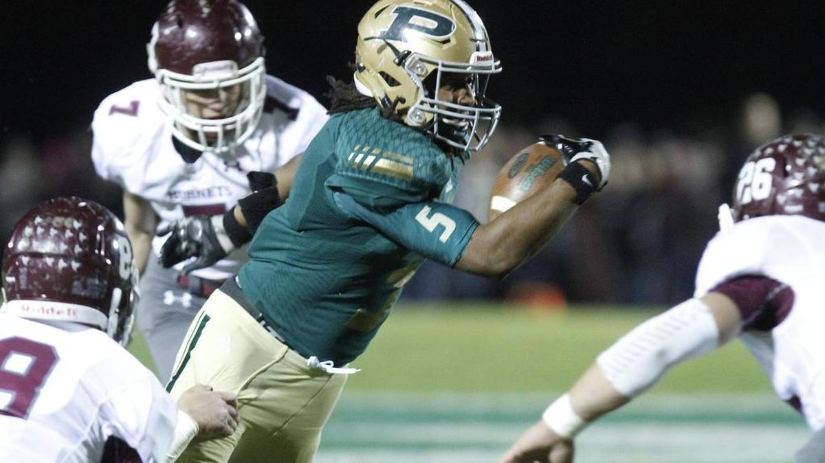 Poplarville running back Austin Bolton carries the ball against East Central in the 4A South State championship game. Bolton was named Region 7-4A offensive player of the year.