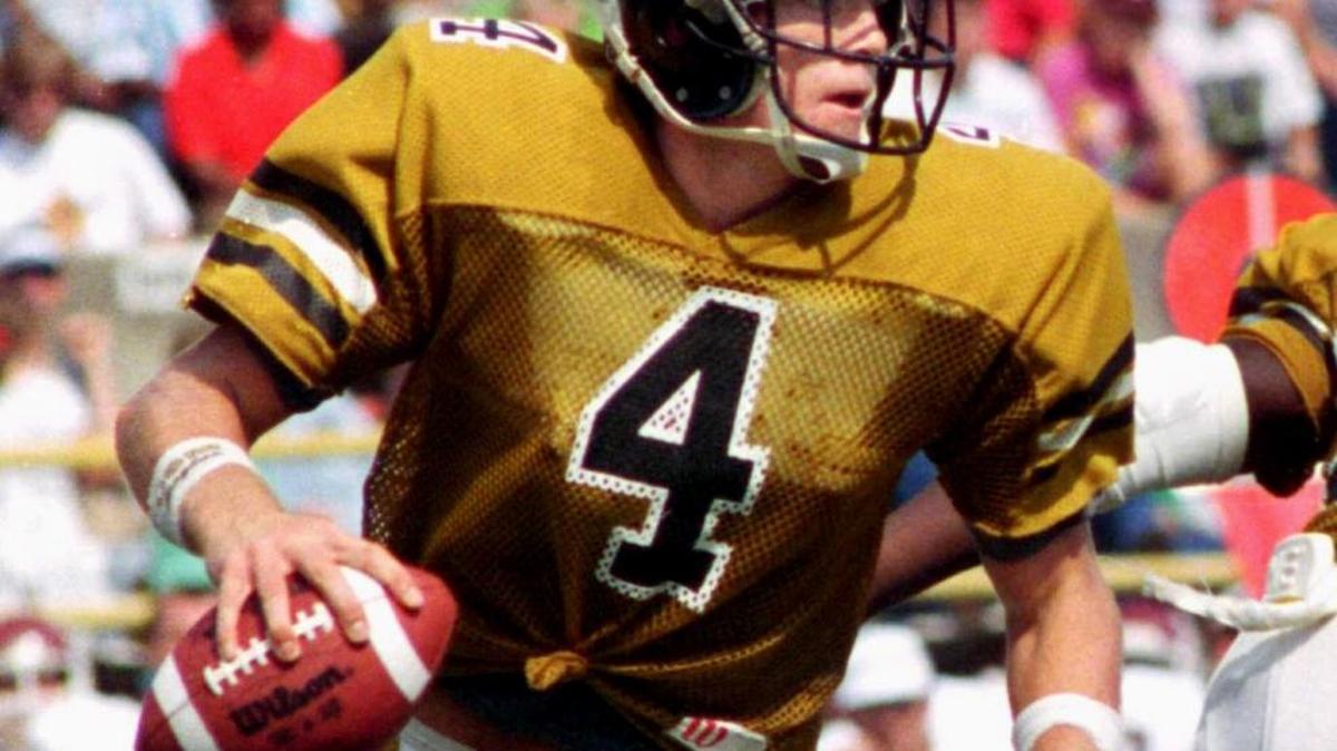 Brett Favre looks for a receiver during game against Texas A&M in Jackson. Favre passed for over 1000 yards in each of seasons as a Golden Eagle.
