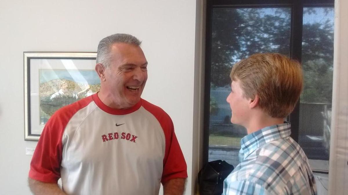 Former Boston Red Sox outfielder Bernie Carbo talks to Breck Jones at the Ohr-O’Keefe Museum on Friday.
