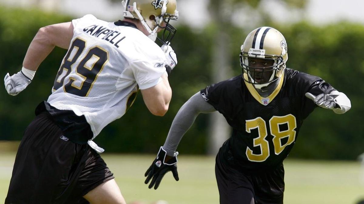 New Orleans Saints safety Bryan Scott (38) covers tight end Mark Campbell (89) on the first day of minicamp at their practice facility in Metairie, La., on Friday April 7, 2006.